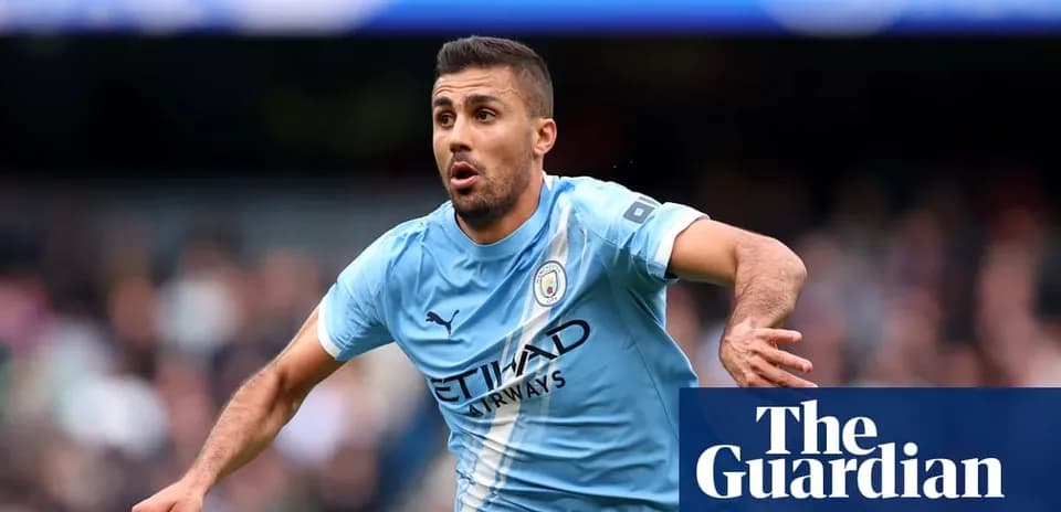 Player running with ball during Manchester City match