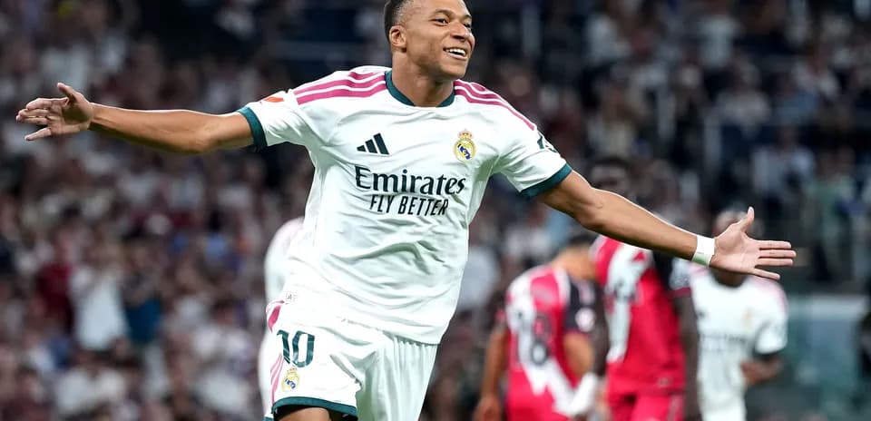 Player celebrating after scoring a goal during match