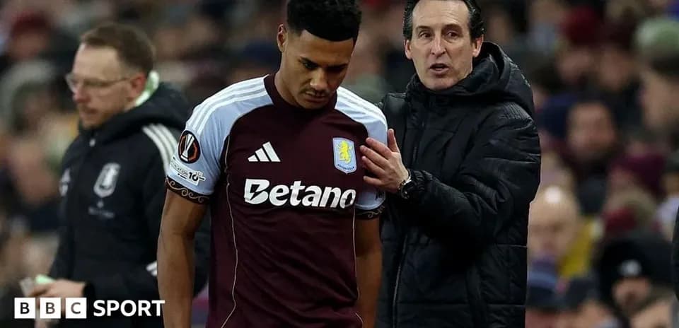 Manager speaking with player during match substitution