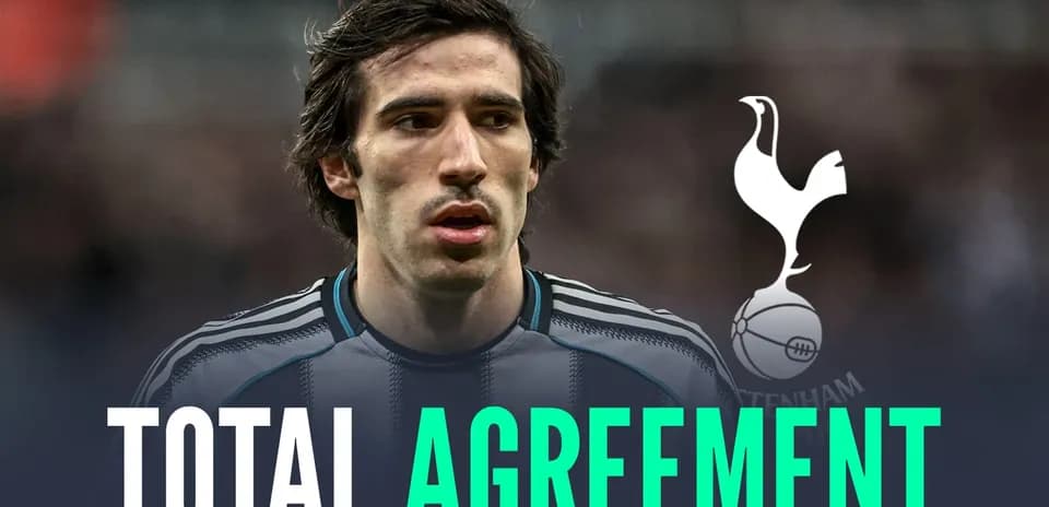 Player in Tottenham kit with text 'TOTAL AGREEMENT'