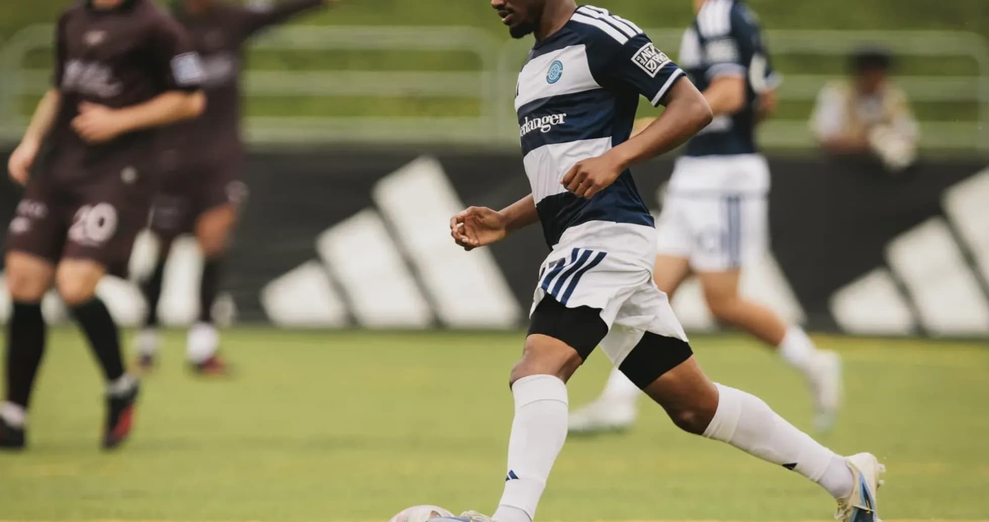 Player dribbling the ball during Chattanooga match