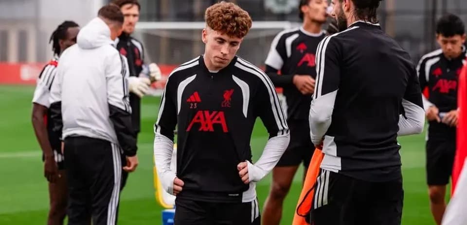 Liverpool players in training session on pitch