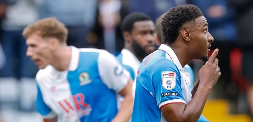 Player celebrating with a finger to lips gesture