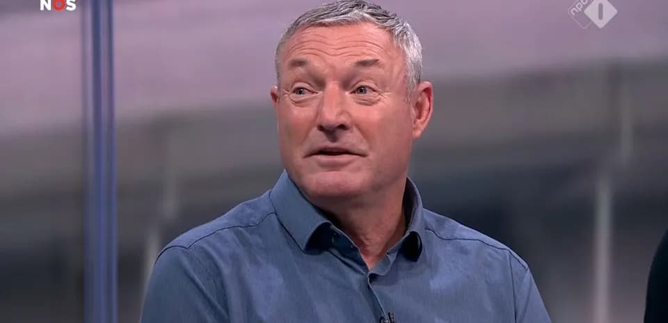 Sport analyst discussing on television set