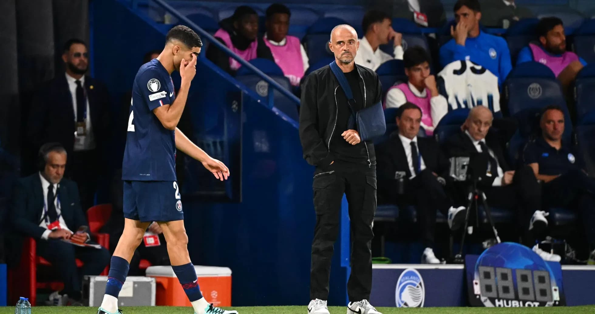Player leaving the pitch while coach observes