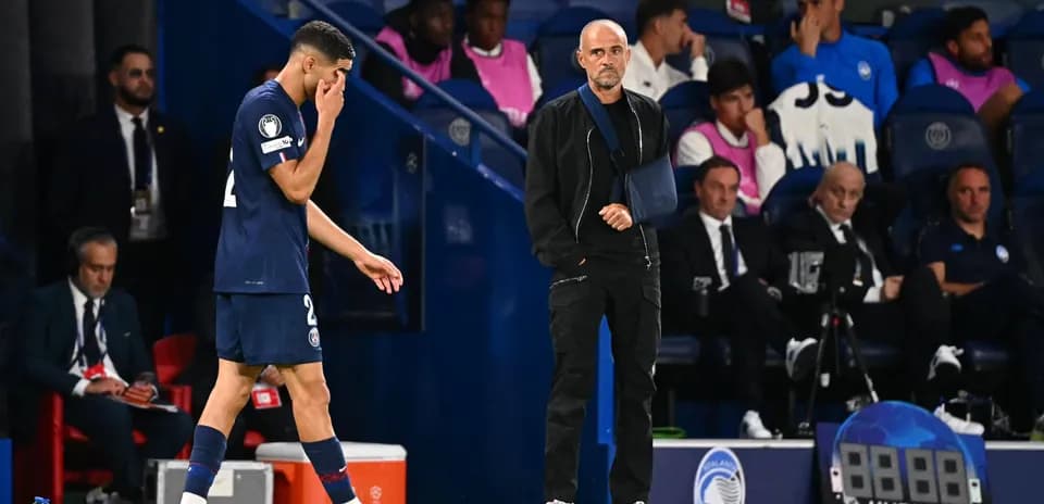 Player leaving the pitch while coach observes