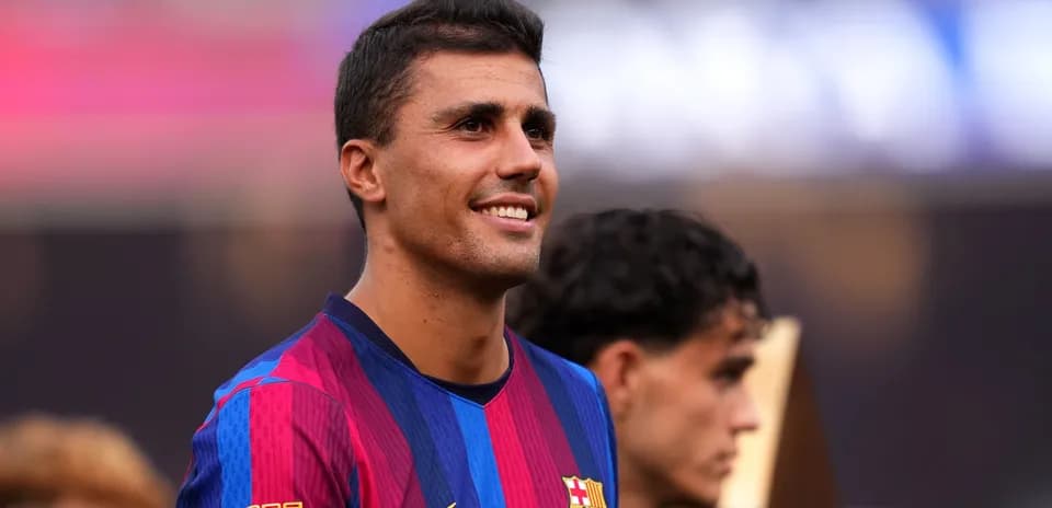 Player smiling during celebration at event