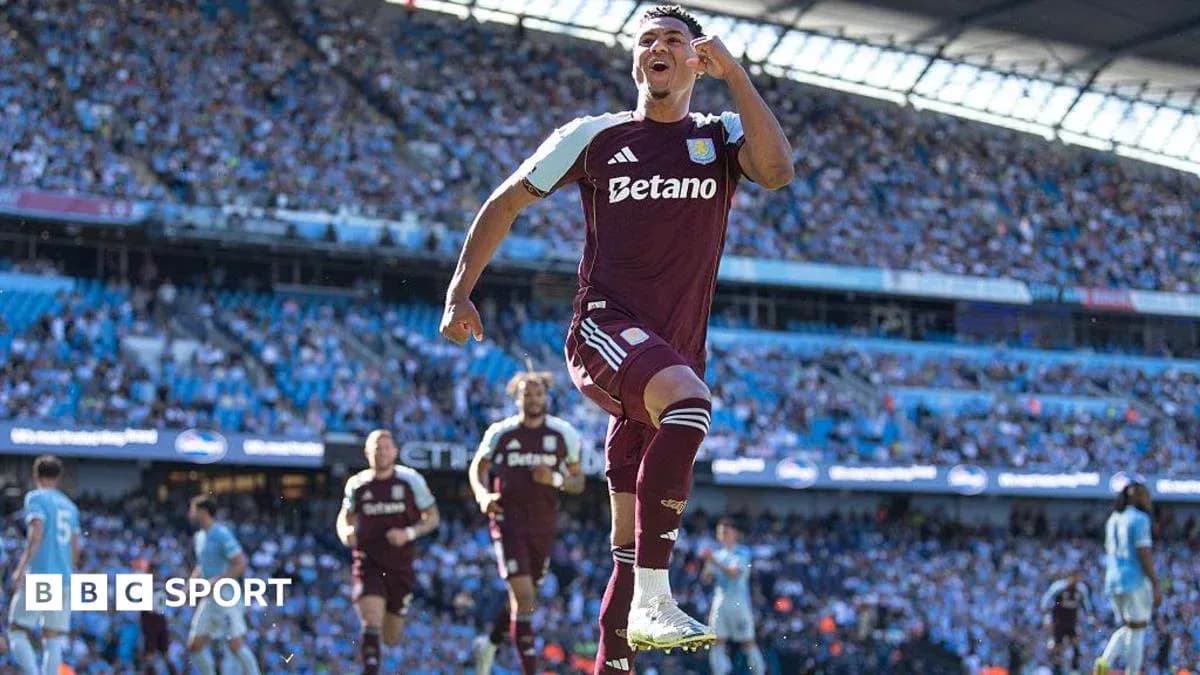 Aston Villa player celebrating a goal at stadium