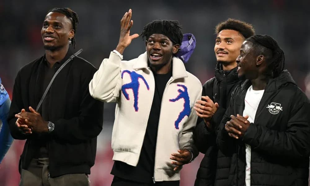 Four players interacting in a stadium setting