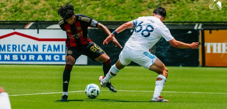 Atlanta United II player tackling New York City II player