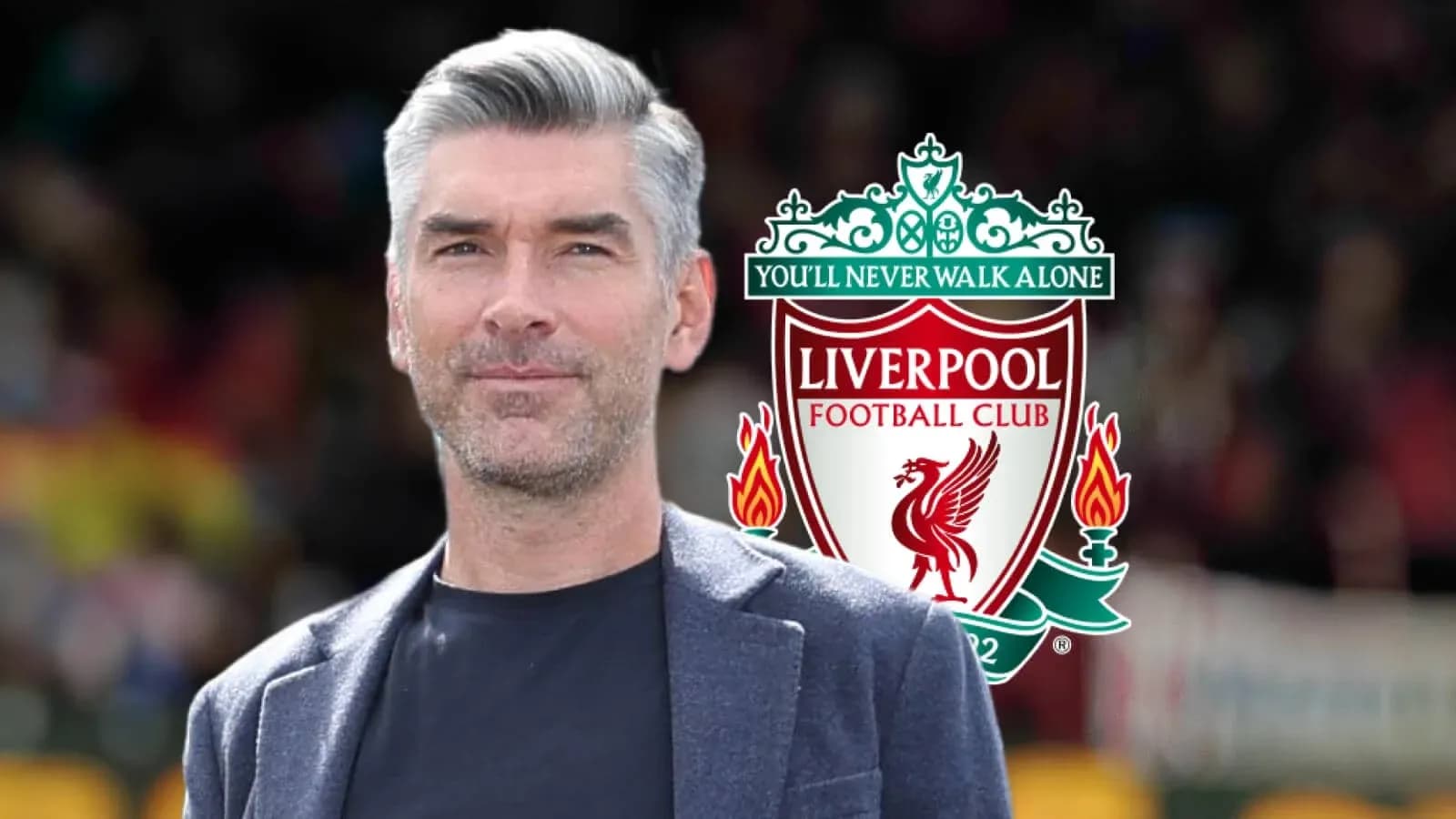 Man posing with Liverpool FC logo in background