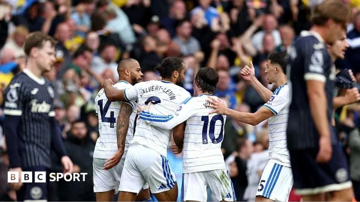 Players celebrating a goal during a football match