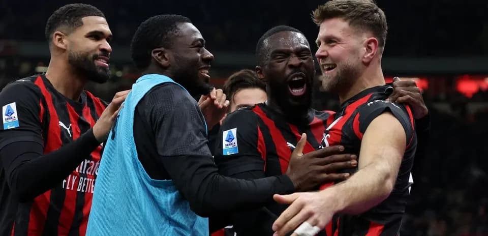 AC Milan players celebrating a goal during match