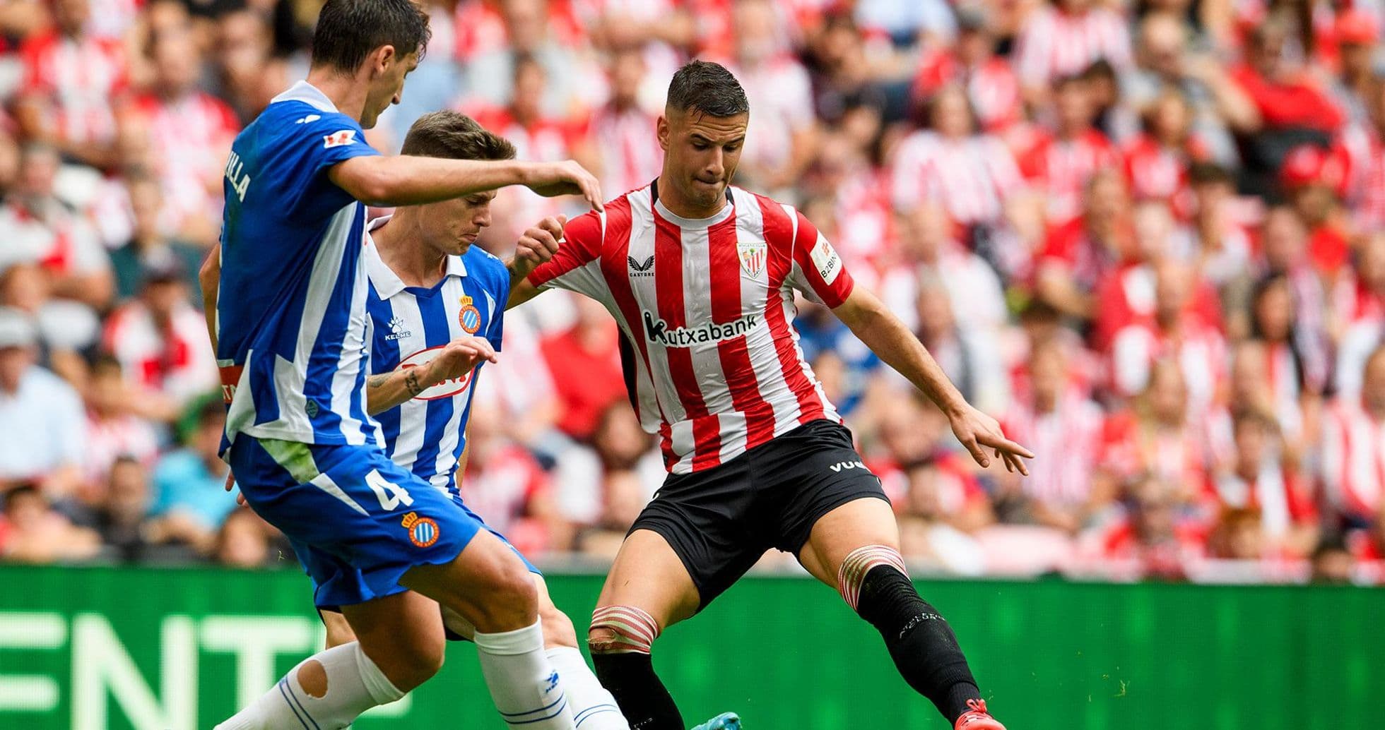 Players competing for the ball during La Liga match