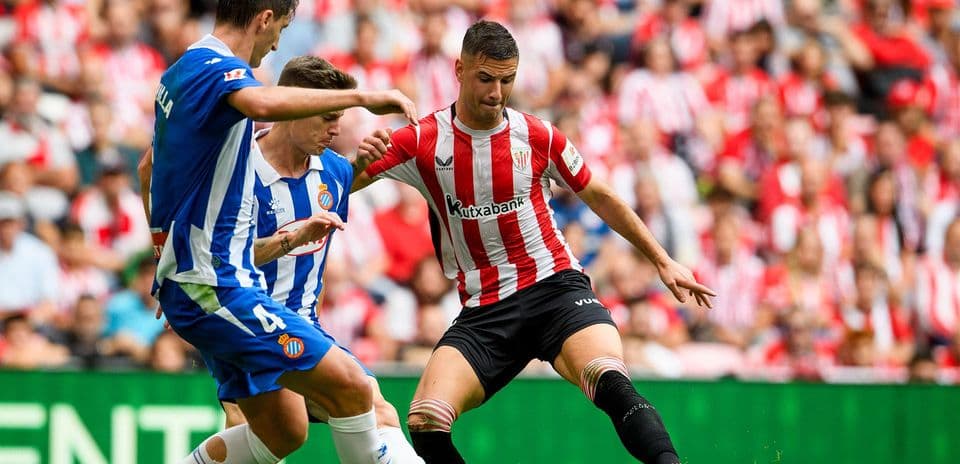 Players competing for the ball during La Liga match