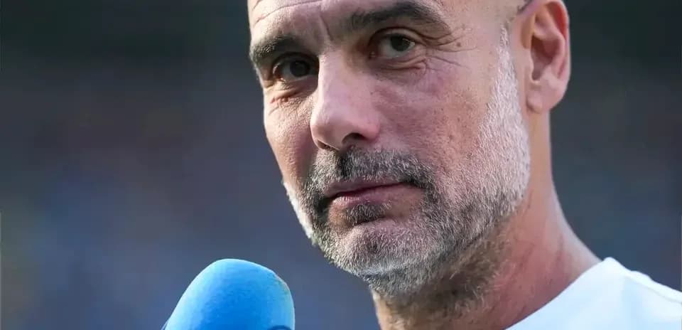 Manager speaking into microphone at event