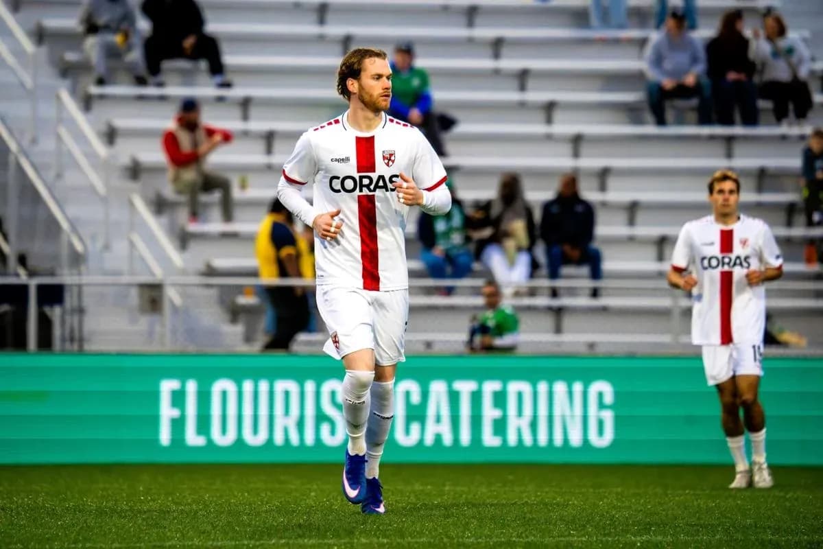 Loudoun United player warming up on field