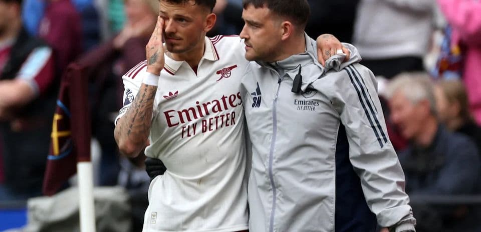 Player being supported by staff after match