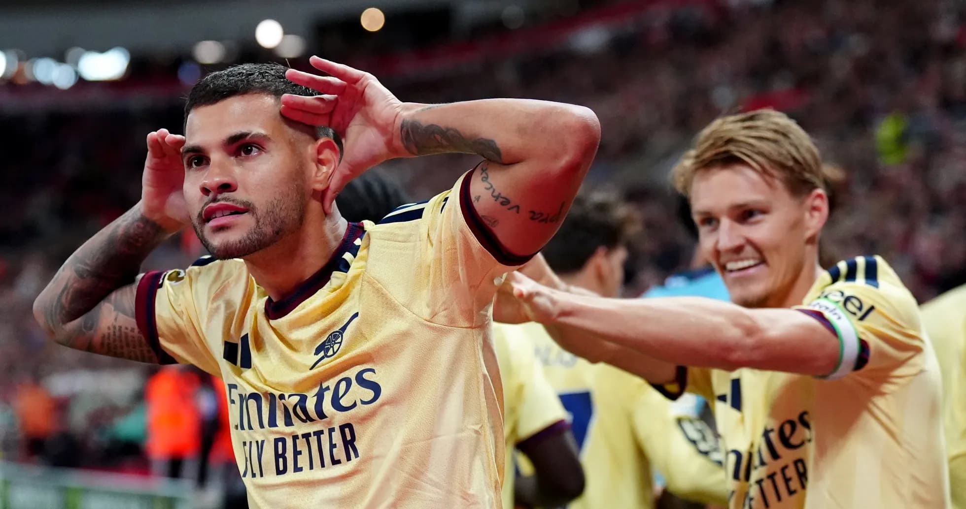 Arsenal players celebrating a goal during match