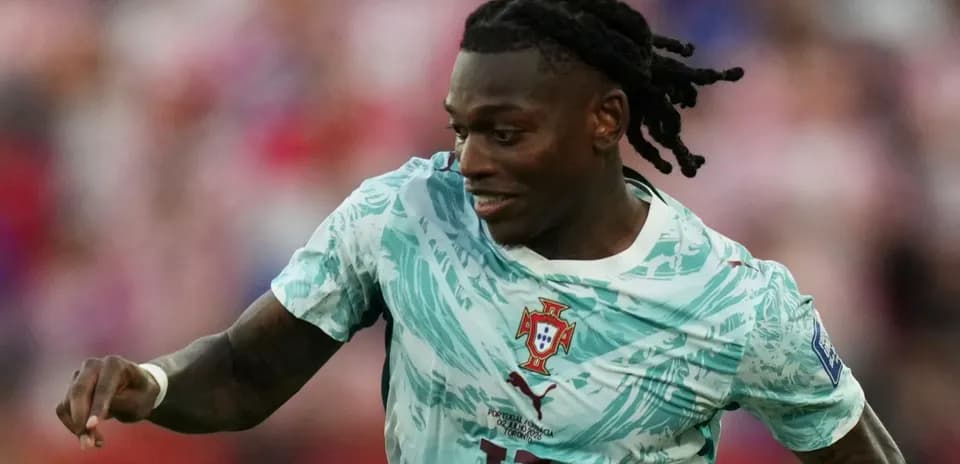 Player running with ball during football match