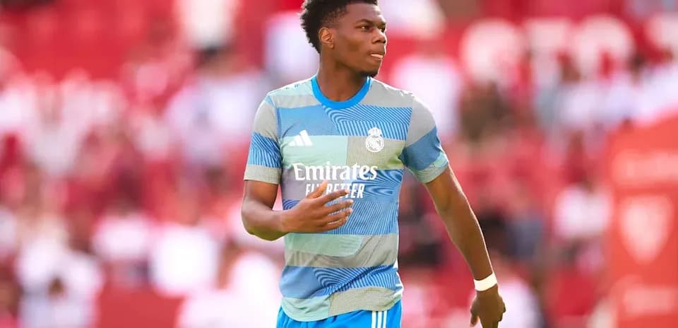 Player in Real Madrid training kit on field