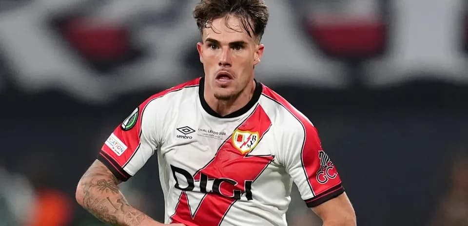 Player in Rayo Vallecano jersey running on field