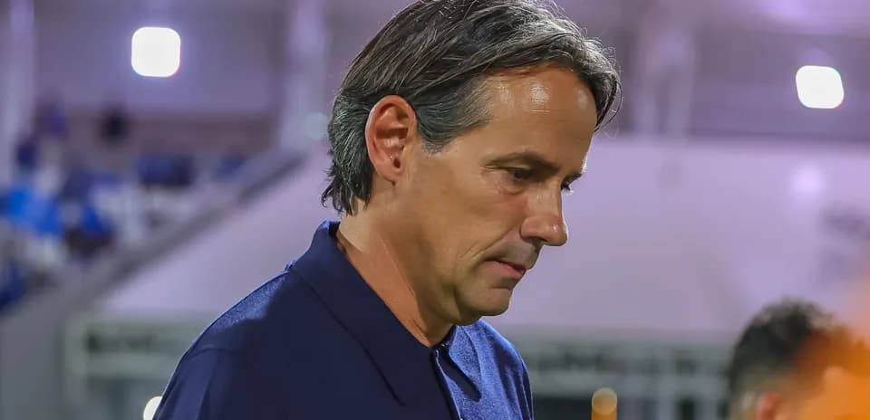 Coach walking on the sideline during a match