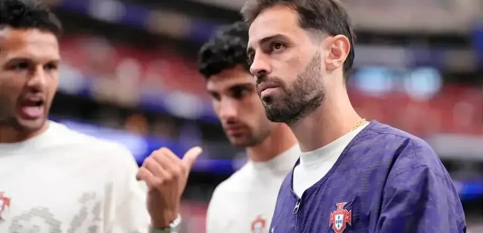 Three Portugal players discussing before the match