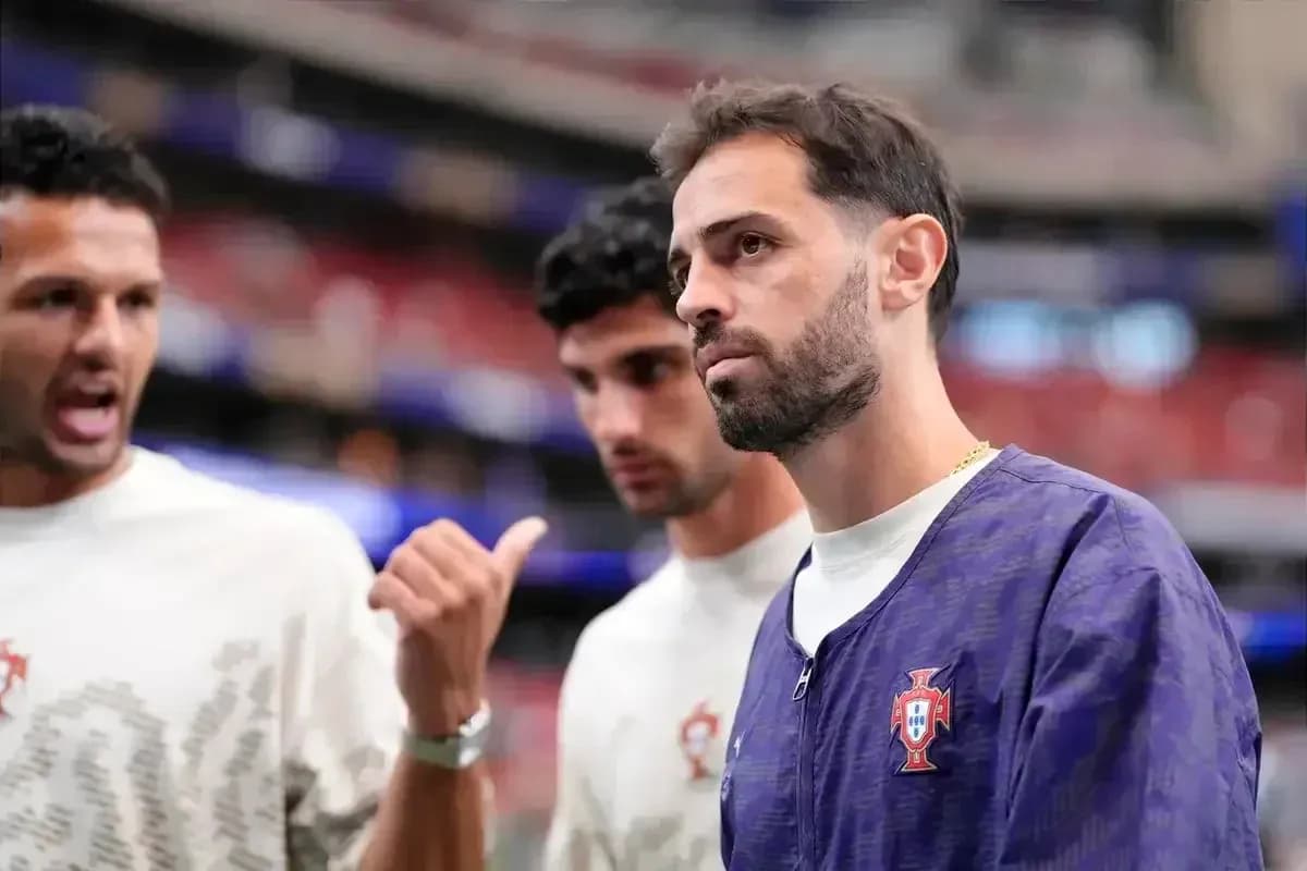 Three Portugal players discussing before the match