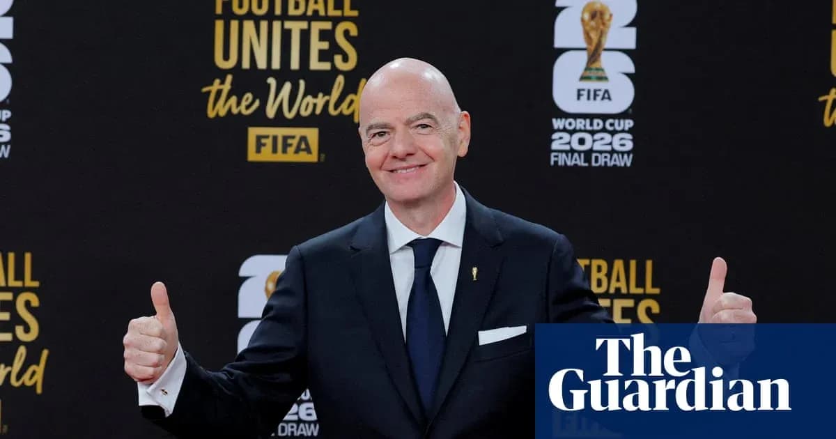 Gianni Infantino giving thumbs up at FIFA event