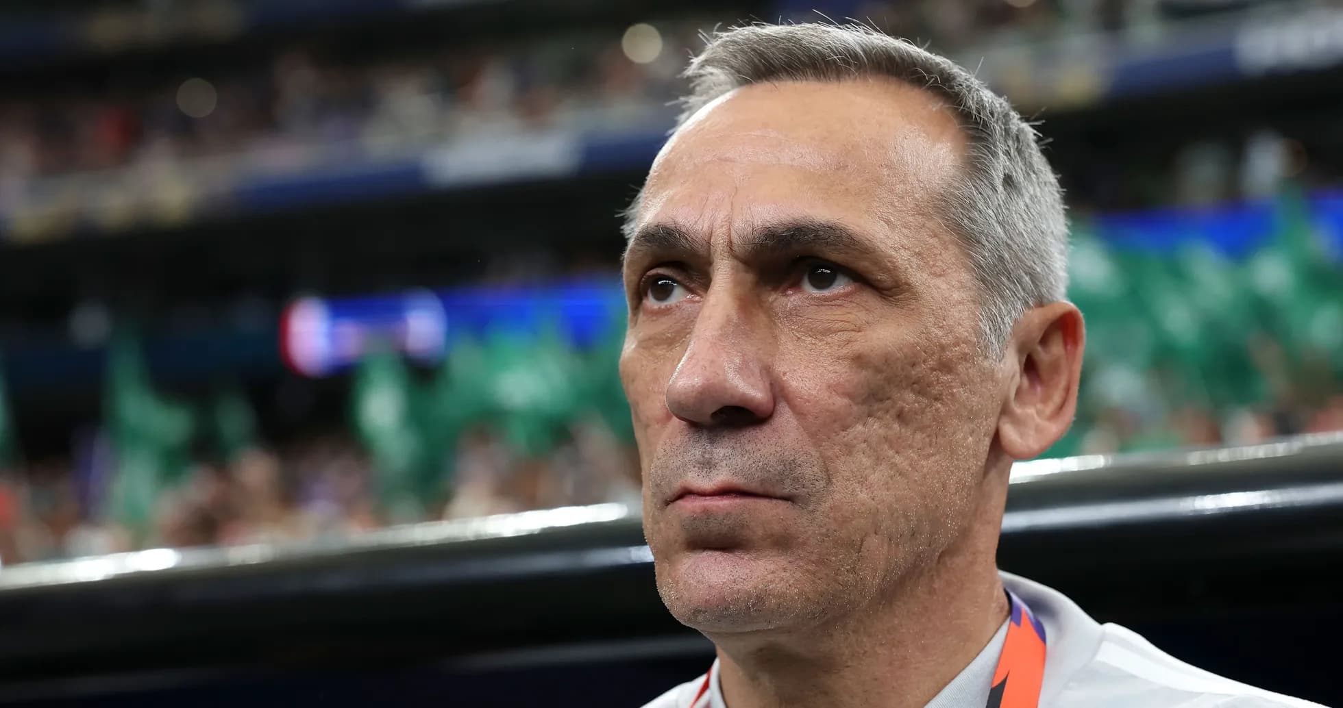 Coach focused during match in stadium
