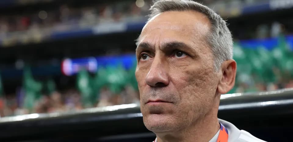 Coach focused during match in stadium