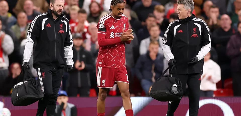 Player leaving the field with medical staff assistance