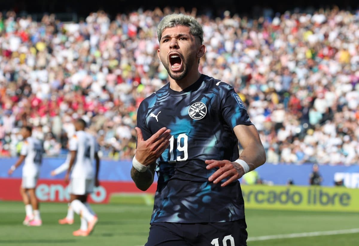 Player celebrating passionately after scoring a goal