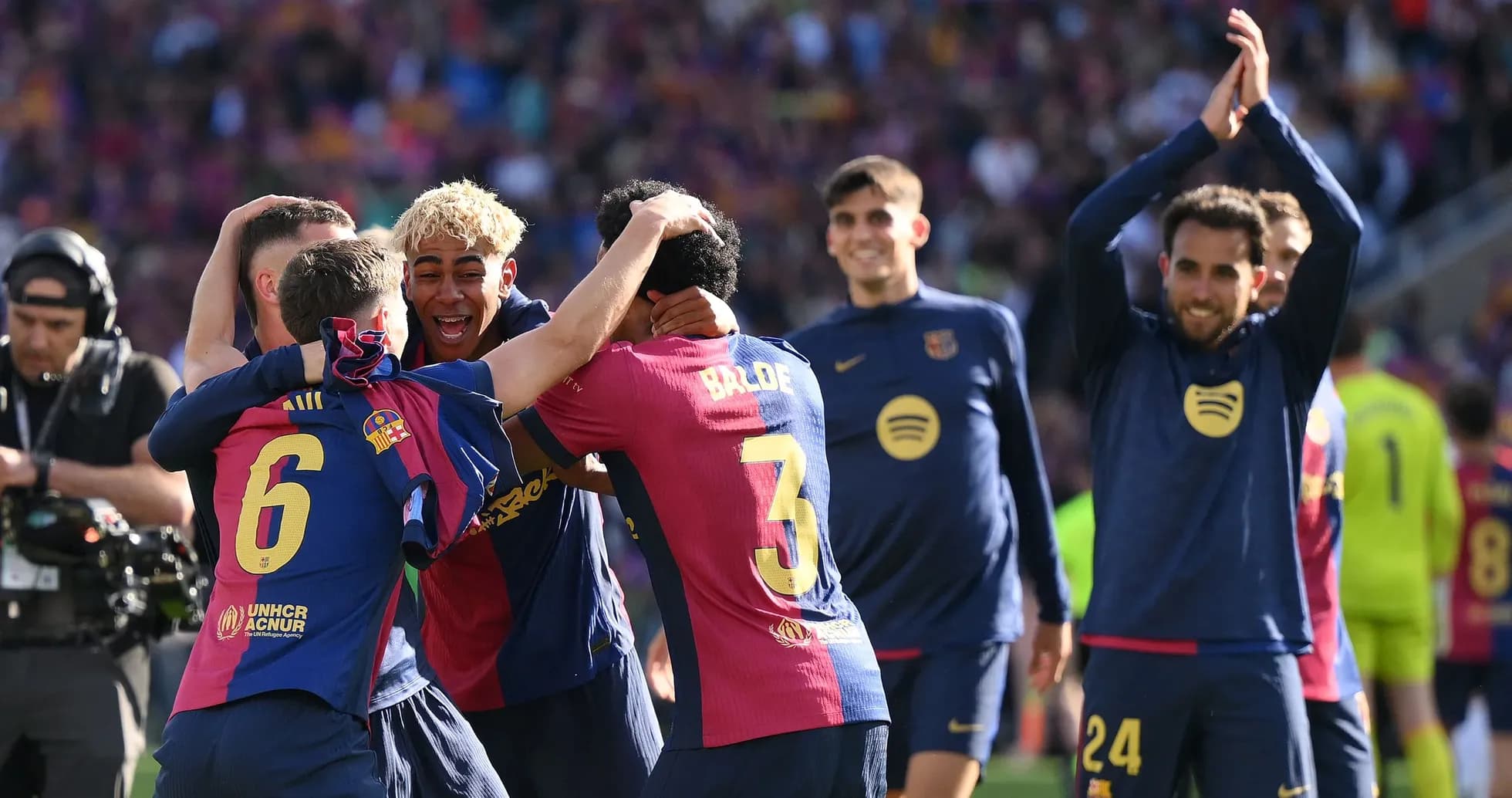Barcelona players celebrating after a match victory