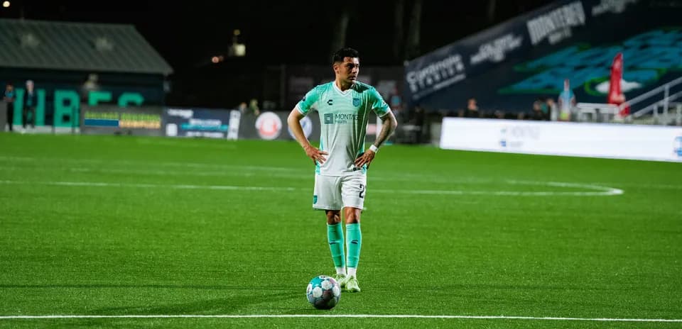 Monterey Bay player preparing for a free kick