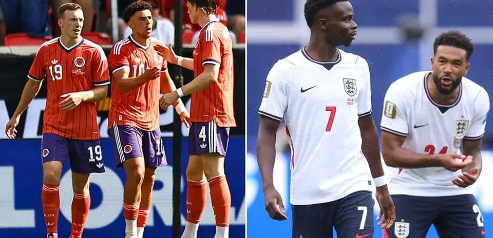 Colombia and England players interacting on the pitch