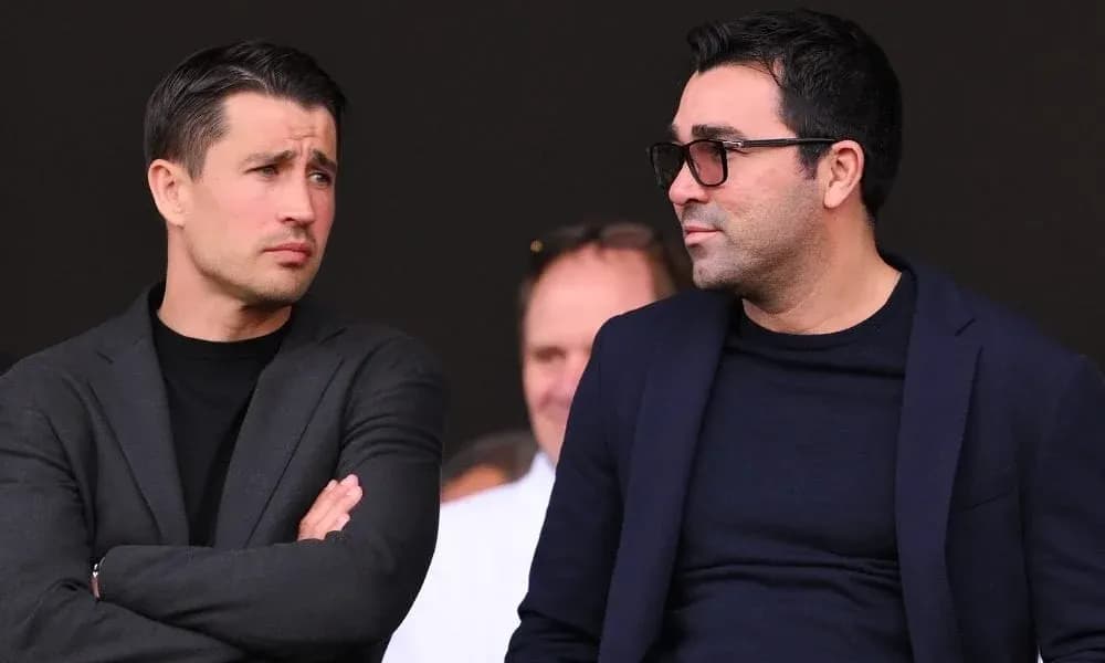 Two men discussing during a sports event