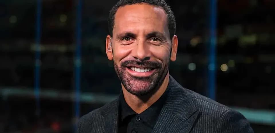 Sport analyst smiling during broadcast segment