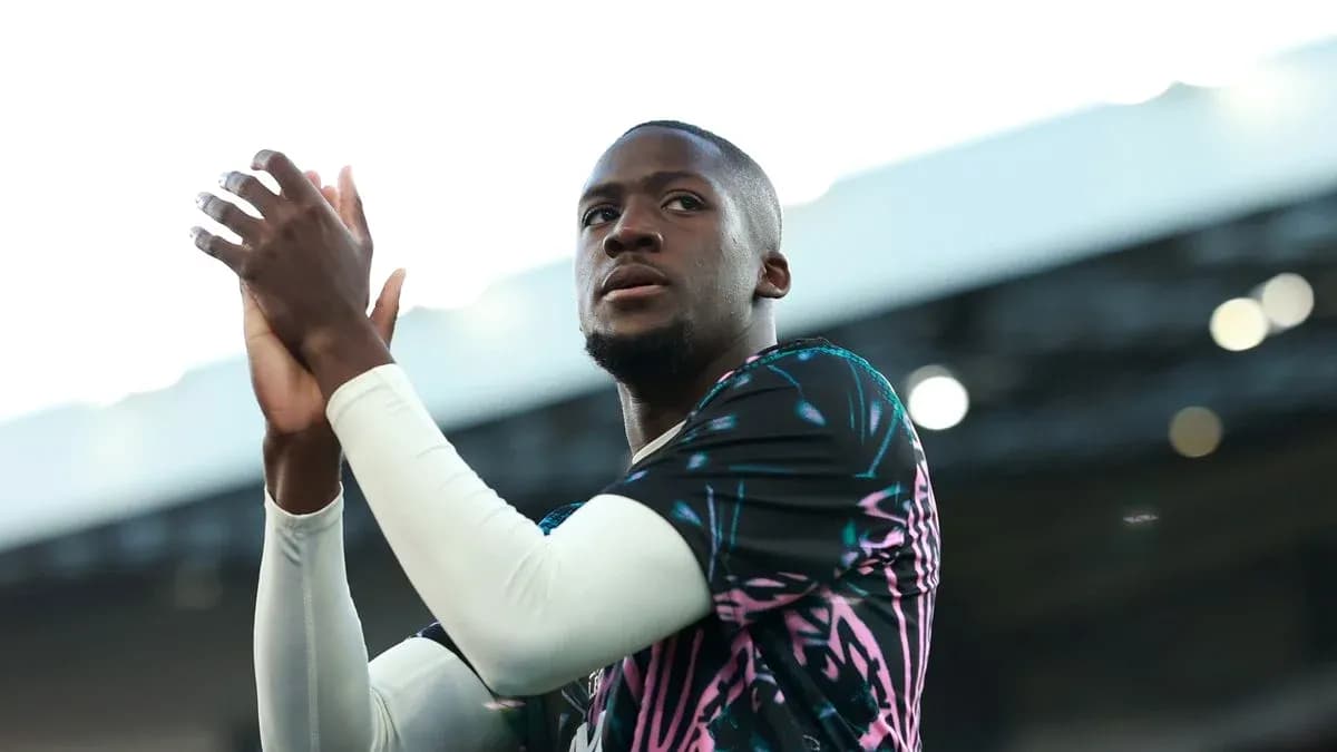 Player applauding fans during match warm-up