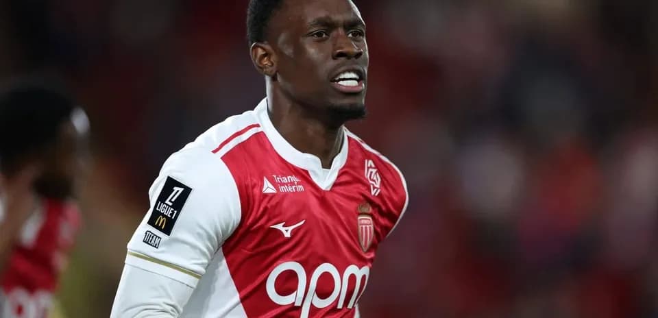 Player celebrating in AS Monaco home kit