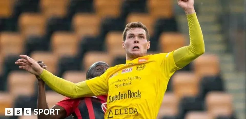 Player jumping for a header during a match