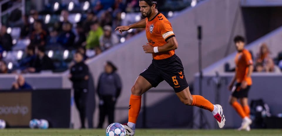 Player dribbling the ball during match