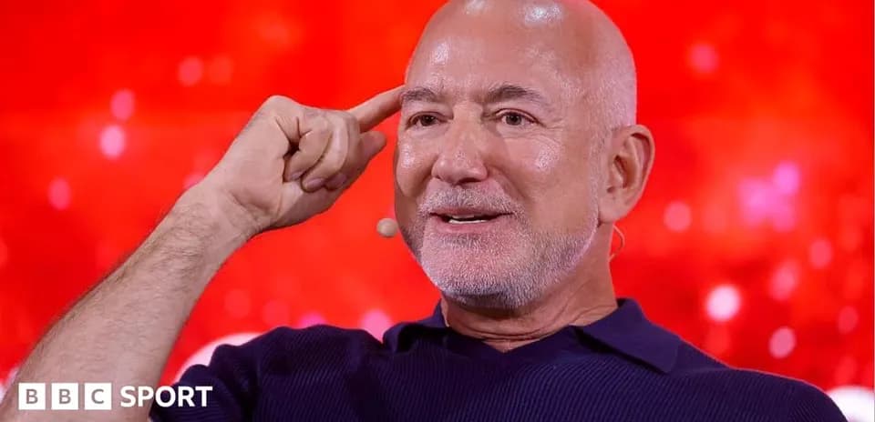 Speaker gesturing during a presentation on stage