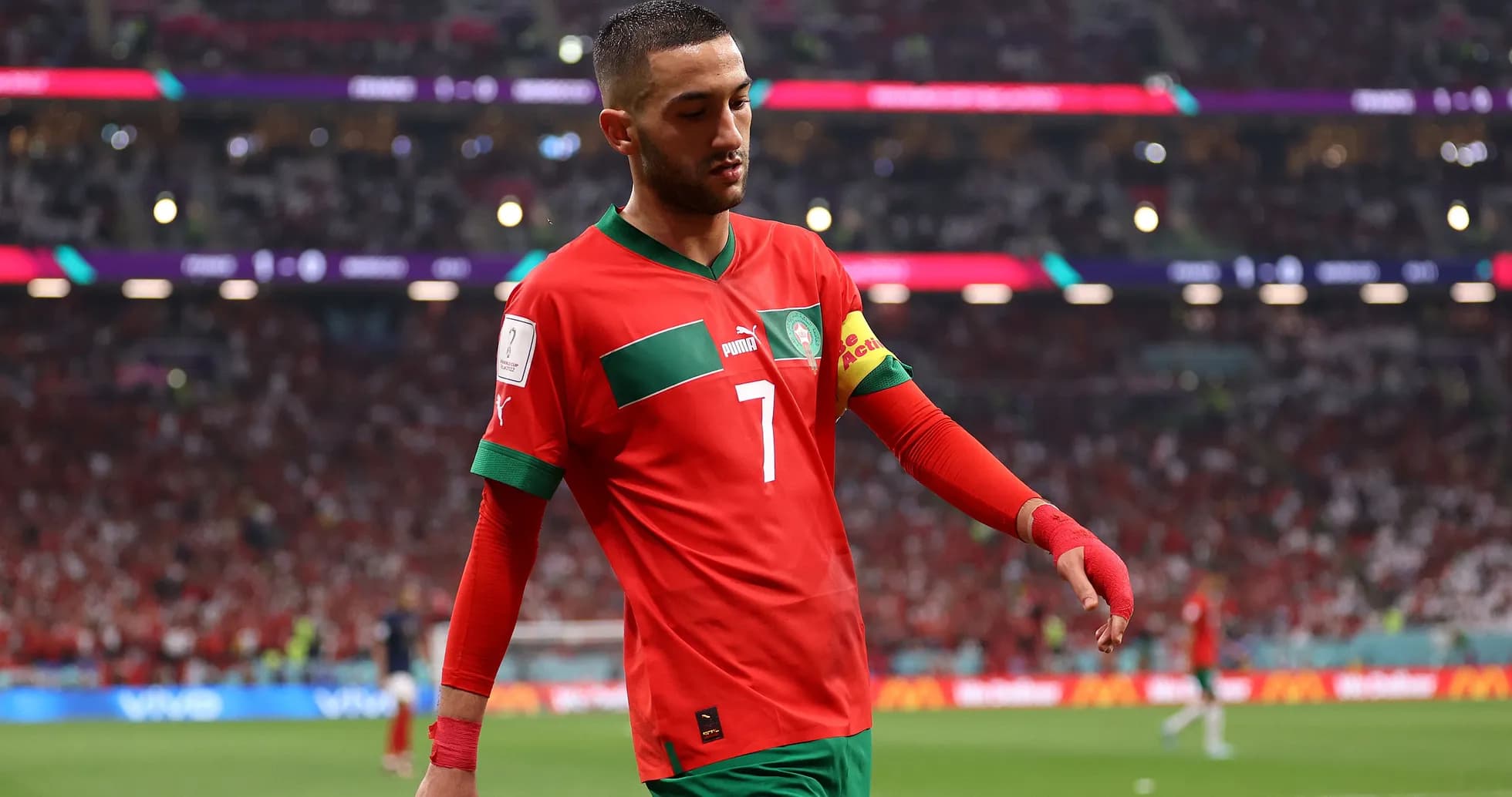 Morocco player wearing red jersey during match