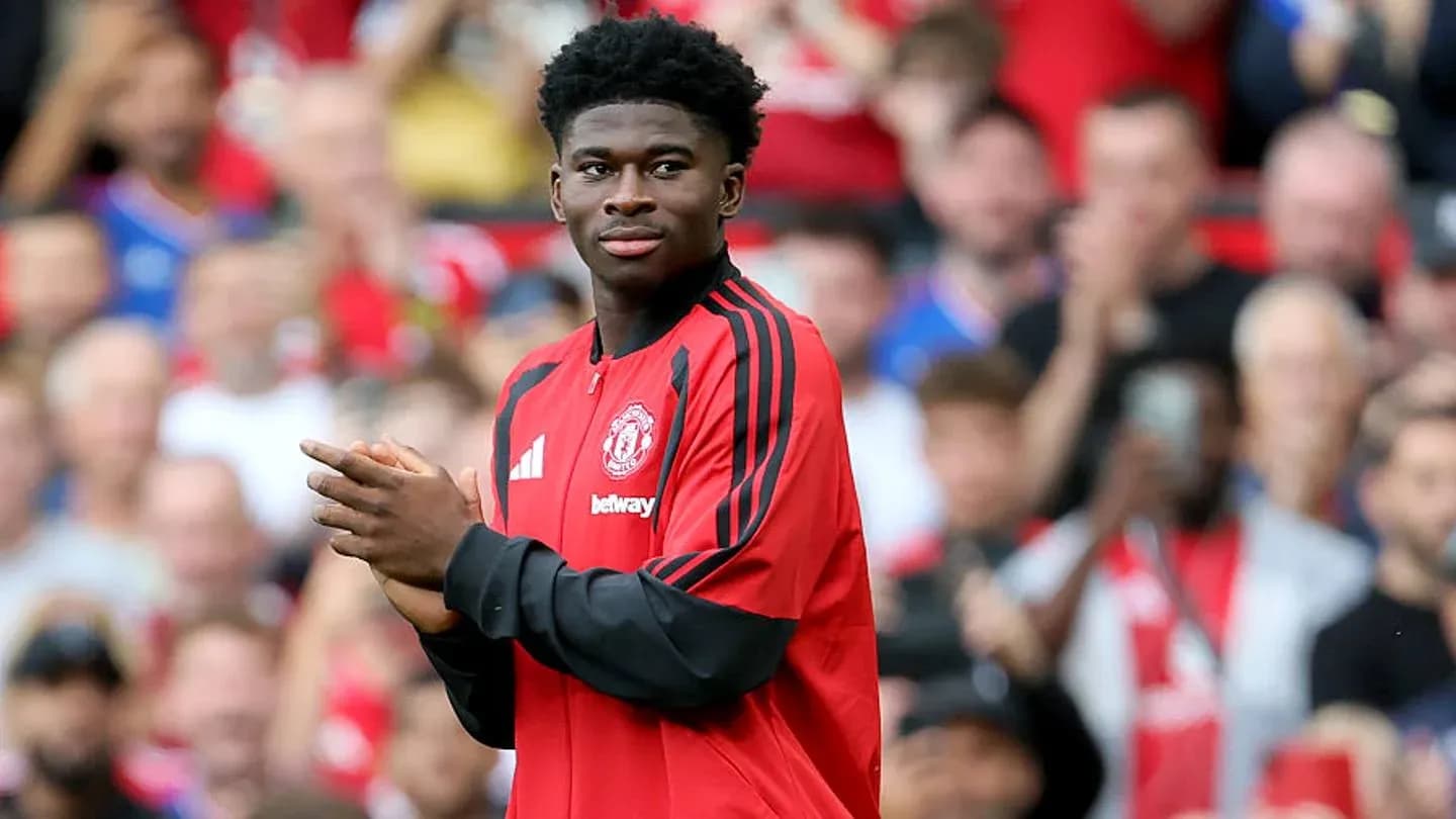 Player applauding during Manchester United match warm-up