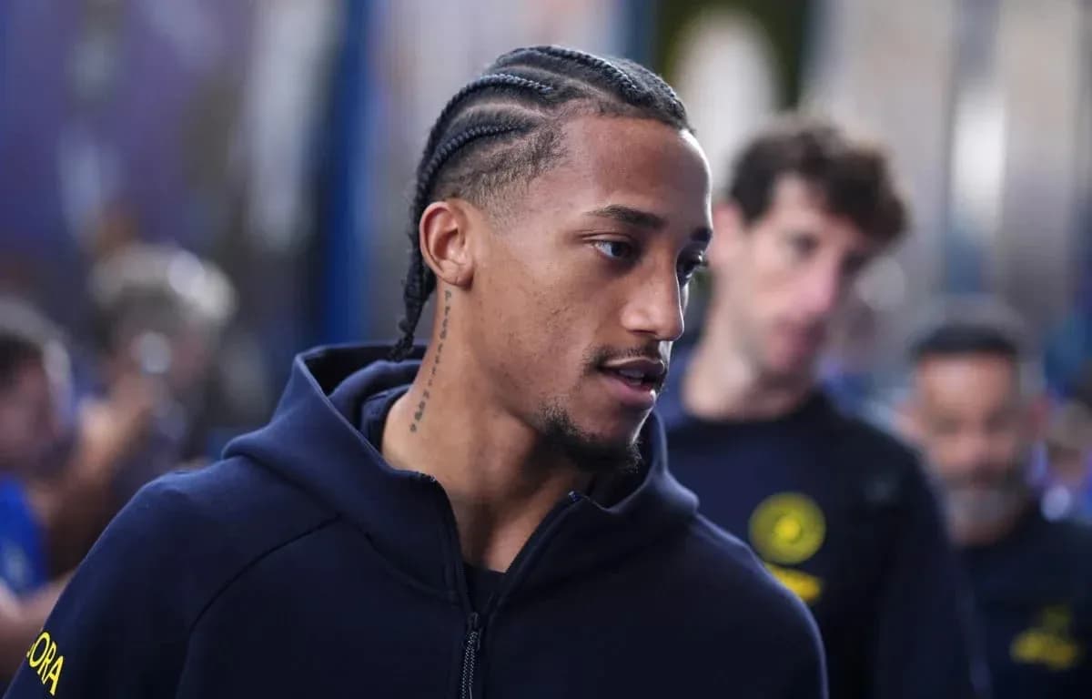 Player with braided hair arriving at venue