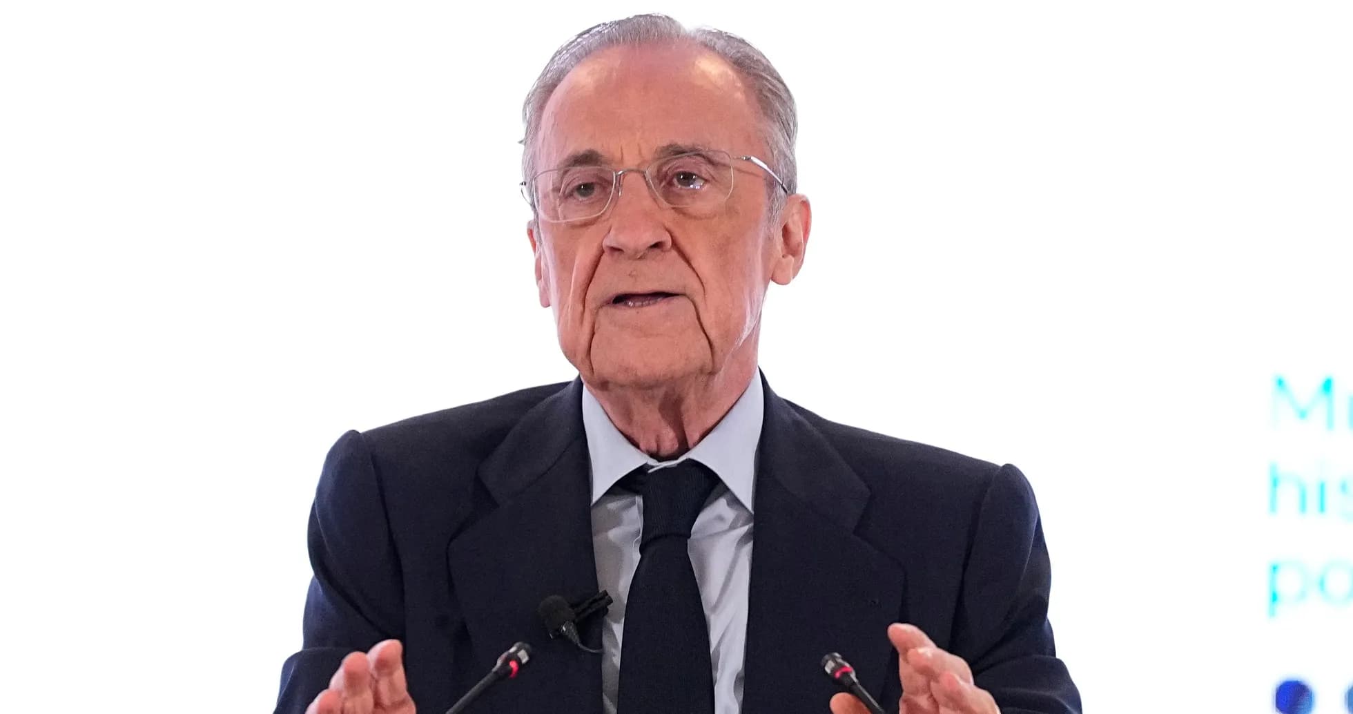Person speaking at a podium during an event