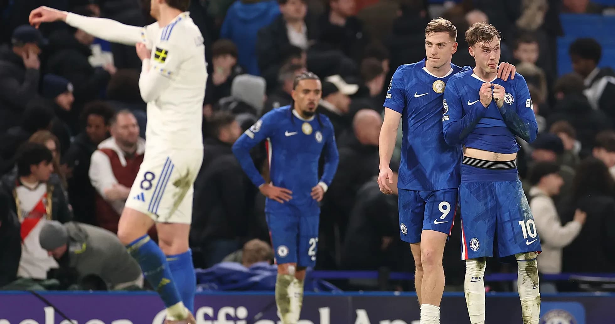 Chelsea players showing disappointment after match conclusion