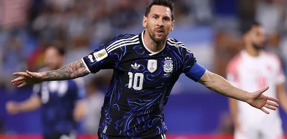 Player celebrating a goal in Argentina jersey